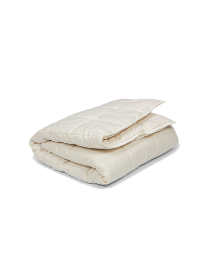 Bettdecke aus Baumwolle mit Schurwollfüllung