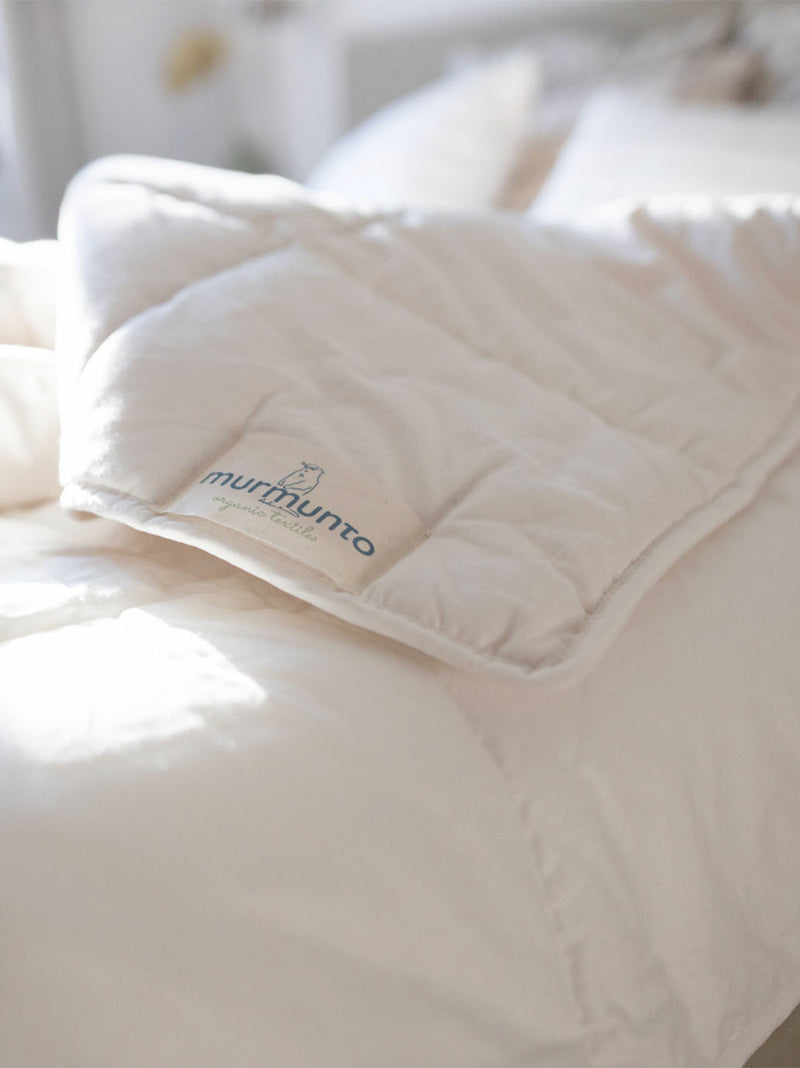 Bettdecke aus Baumwolle mit Schurwollfüllung