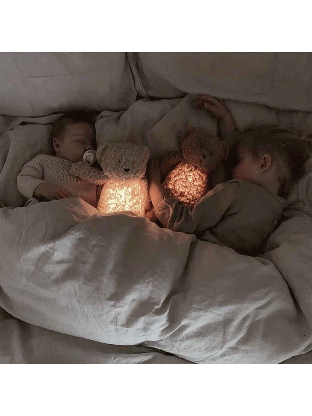 Ours en peluche bio fredonnant avec une lampe de chevet