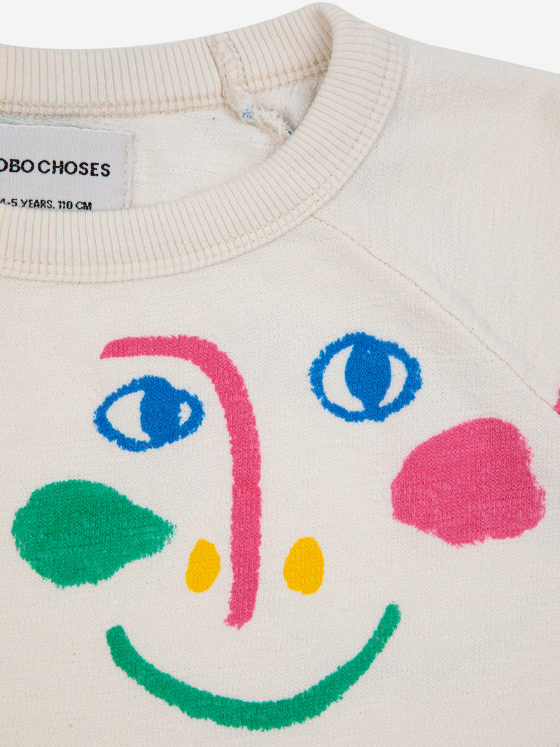 „Smiling Mask“-Sweatshirt mit durchgehenden Raglanärmeln