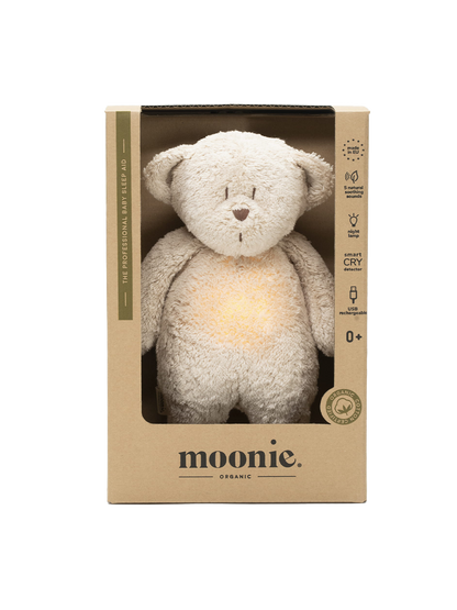 Ours en peluche bio fredonnant avec une lampe de chevet