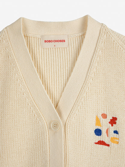 Gilet tricoté avec col V et boutons