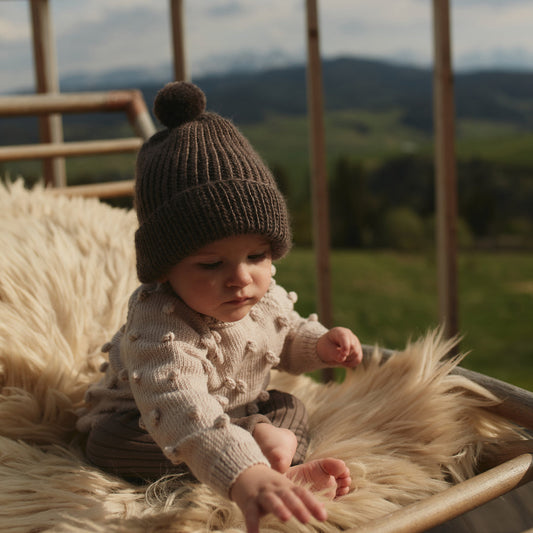 Bonnet à pompon en laine mérinos