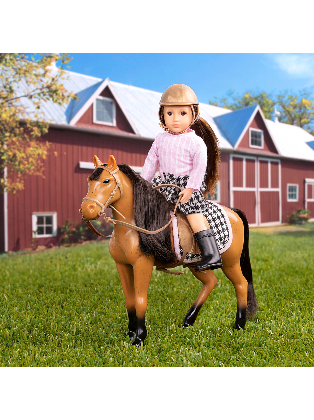 Une petite poupée jockey avec un cheval 